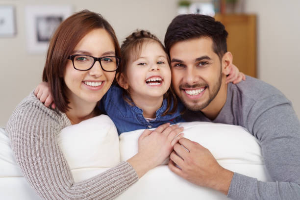 istock Happy young family posing for the camera 1126624099