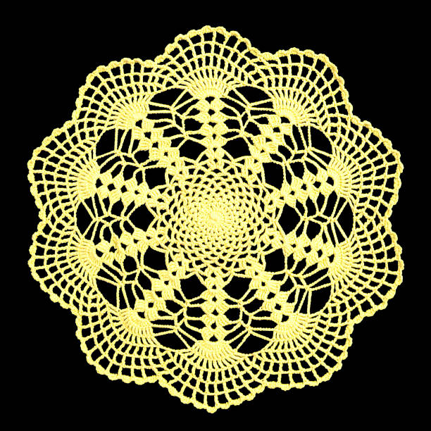 istock Isolated crocheted bright lime color doily with a pattern of arches on a black background. Round decorative cotton doily 1126626907