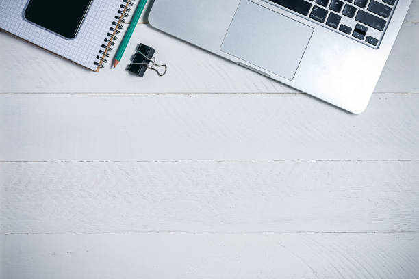 istock modern business tools on a wooden white background with place for copy space 1126628492