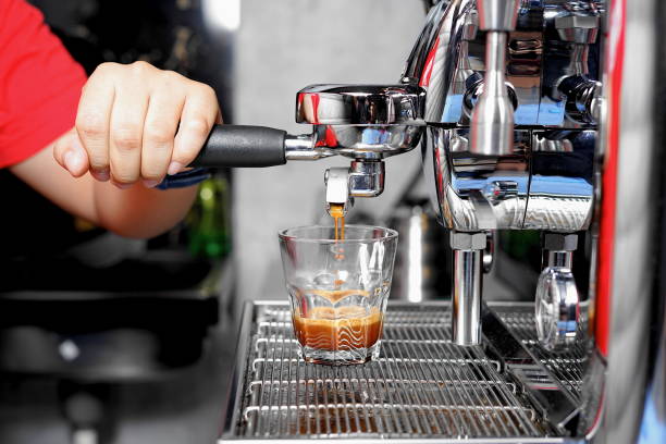 Close-up of barista making coffee in the Coffee Shop stock photo