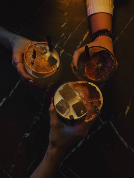 istock Friends holding cocktail glasses 1126631155