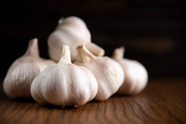 istock Garlic bulb on the wooden vintage background 1126631939