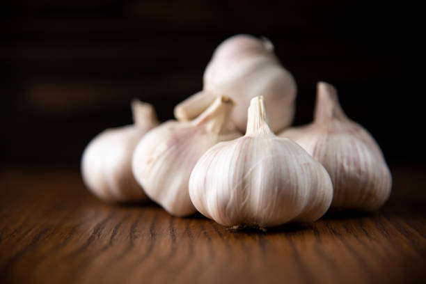 istock Garlic bulb on the wooden vintage background 1126631952