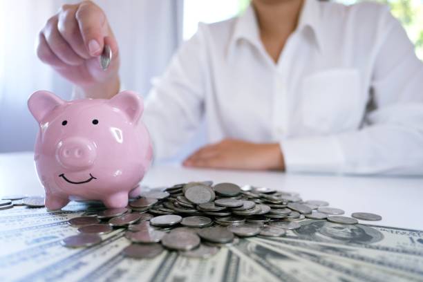 istock Female hand stack coins  growing business. Saving money. 1126634474