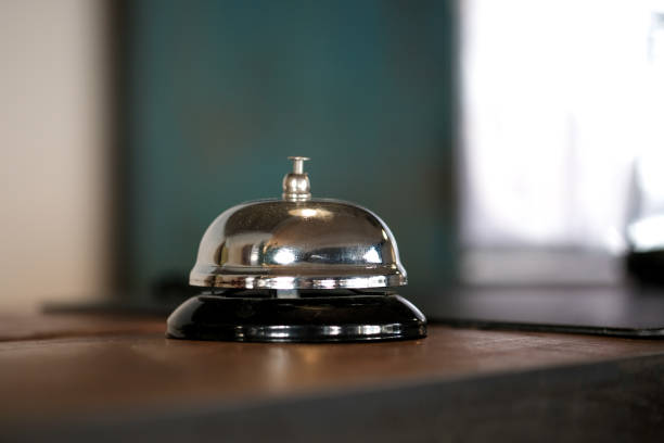 istock Hotel reception counter desk with service bell. 1126634515