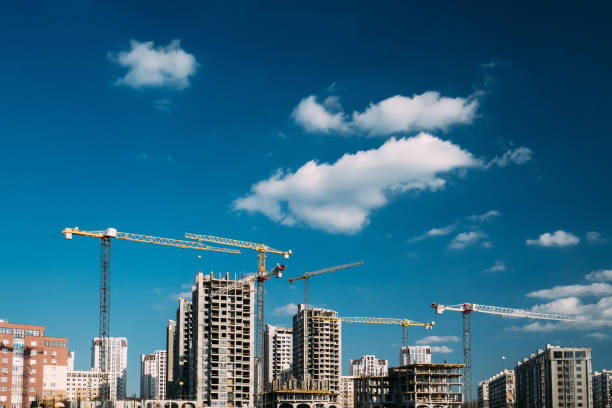 istock Construction Crane Is Involved In Development Of A New Multi-storey Residential Building 1126634645