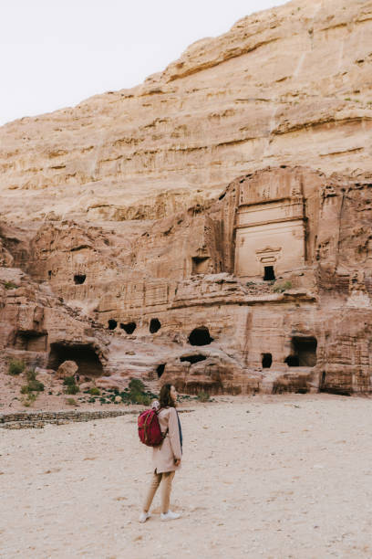 istock Woman walking and exploring Petra 1126639415