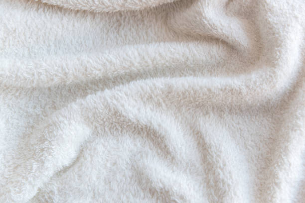 istock White delicate soft  background of plush fabric 1126640292