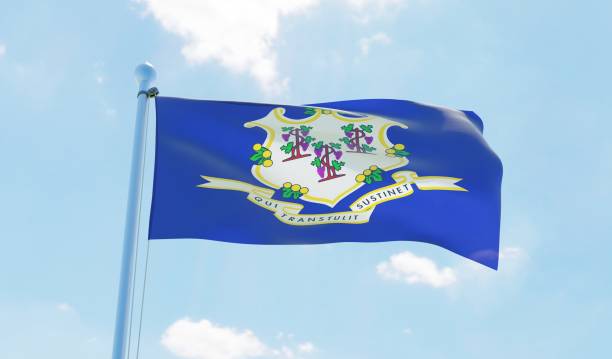 istock Connecticut (USA) flag waving against blue sky 1126640309