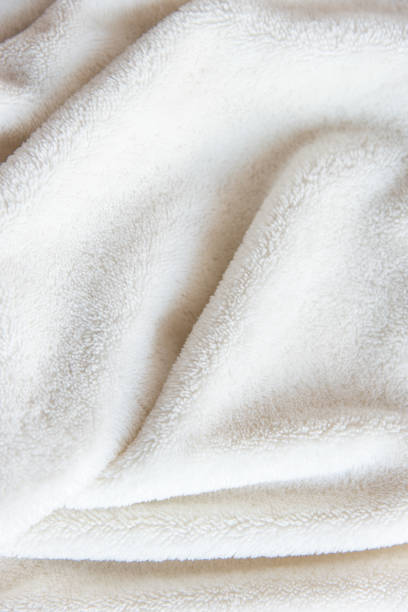 istock White delicate soft  background of plush fabric 1126640332