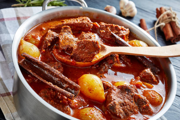istock spicy stifado, beef stew with onion bulbs 1126641586