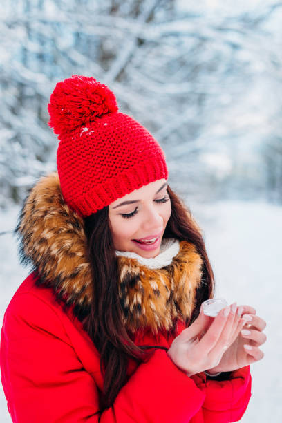 istock Girl protecting lips with lip balm in winter 1126648460