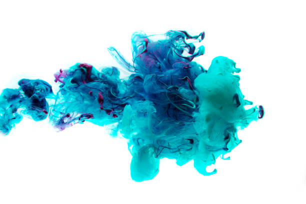 istock colored acrylic paint in water. explosion under water 1126648956
