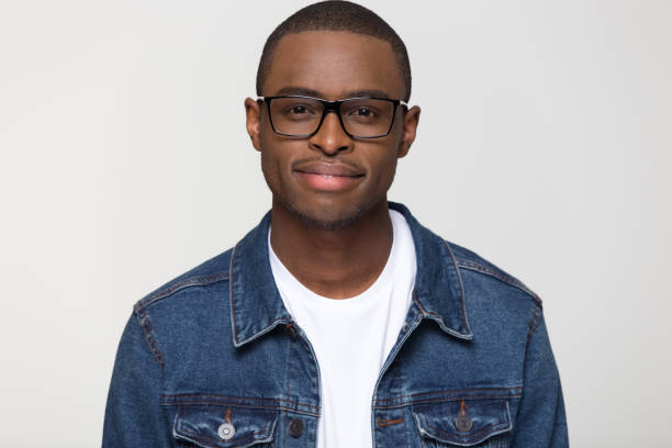 istock Confident young african man looking at camera isolated on background 1126649013
