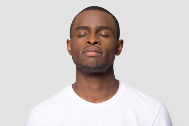 istock Calm mindful african american man enjoy taking deep breath 1126649014