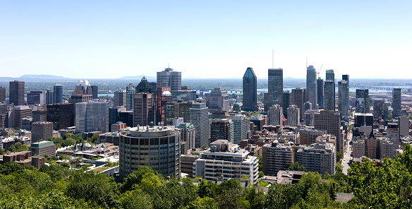 Montreal, Quebec, Canada, June 3, 2018: The skyline of Montreal in the summer from Kondiaronk Belvedere in Mount Royal Park