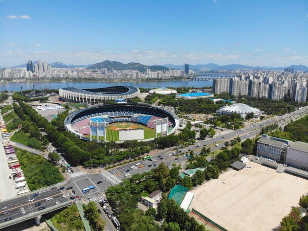 Aerial view Seoul Olympic Park, South Korea. The stadiums are built for the 1988 Summer Olympics and the 10th Asian Games in 1986. Olympic & baseball stadium with city. Seoul, South Korea olympic city stock pictures, royalty-free photos & images