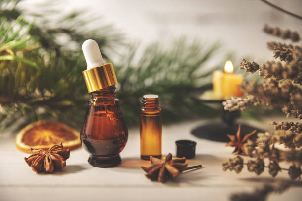 istock aromatherapy treatment - essential oil bottles with herbs 1126653121