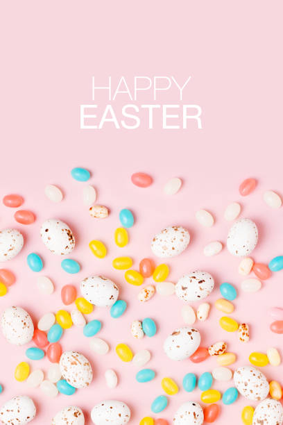 istock Easter candy chocolate eggs and Jellybean on pink background 1126653405