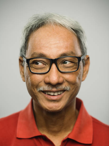 istock Real chinese senior man with excited expression looking away 1126656228