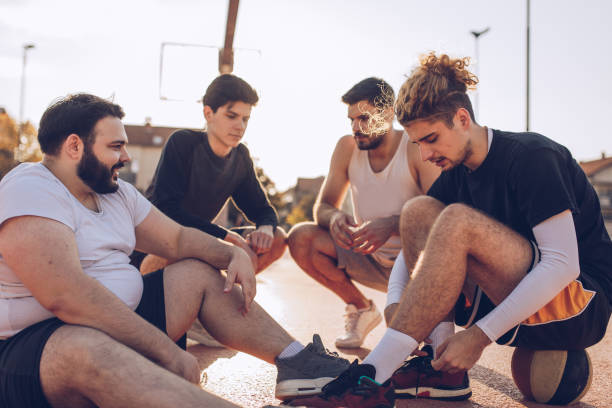 istock Friends relaxing after basketball 1126658231