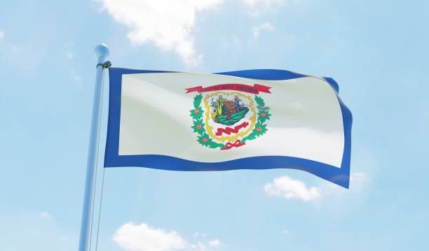 istock West Virginia (USA) flag waving against blue sky 1126658991