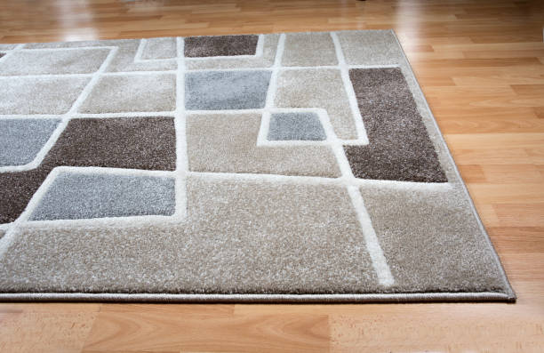 Modern carpet on laminate parquet floor