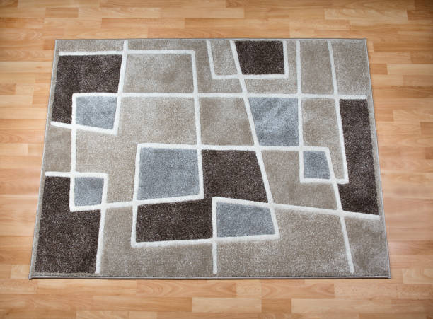 istock Modern carpet on laminate parquet floor 1126659234