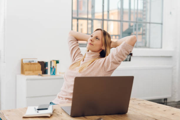 istock Happy satisfied businesswoman taking a break 1126661264