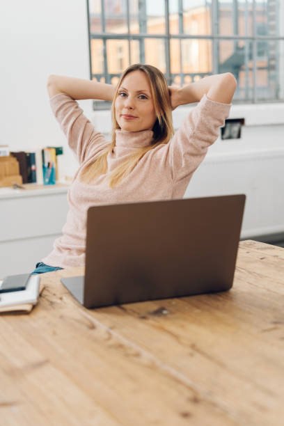 istock Relaxed thoughtful young businesswoman 1126662026