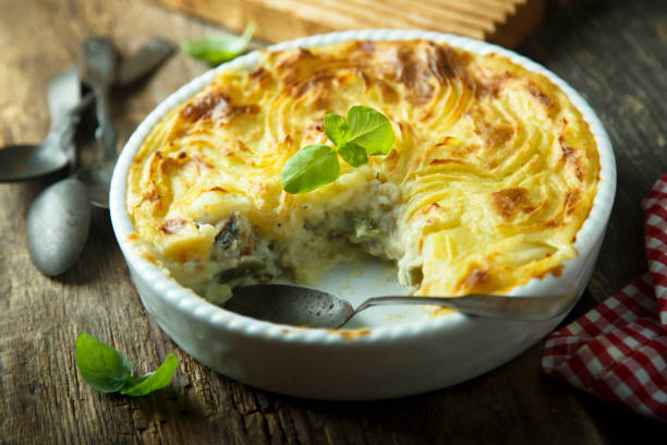 Homemade fish pie Homemade fish pie with mashed potato seafood gratin stock pictures, royalty-free photos & images