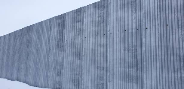 istock metal fence close up 1126663971
