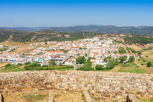Aljezur con encanto con el castillo morisco en primer plano, Portugal photo