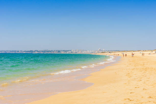 istock Wide, sandy beach next to Armacao de Pera, Portugal 1126667301