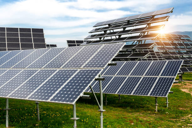 istock Solar panels, photovoltaics, with sun tracking systems -  alternative electricity source, concept of sustainable resources 1126667838