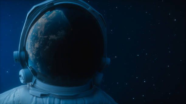 istock A lone astronaut looks at the planet earth in orbit in outer space, the planet earth reflects in a spacesuit helmet. Cinematic 3d illustration for scientific programs on space, planet earth and others 1126668152