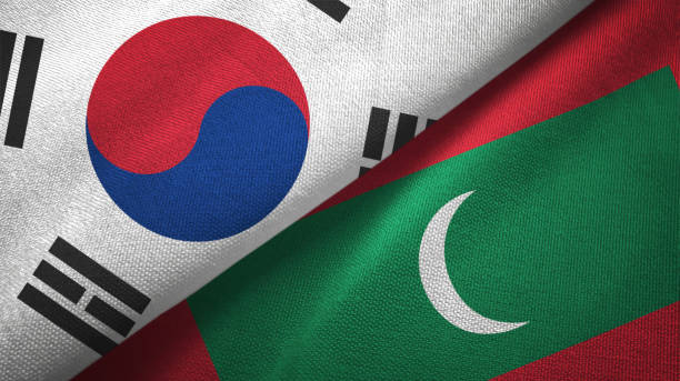 istock Maldives and South Korea two flags together textile cloth, fabric texture 1126668981