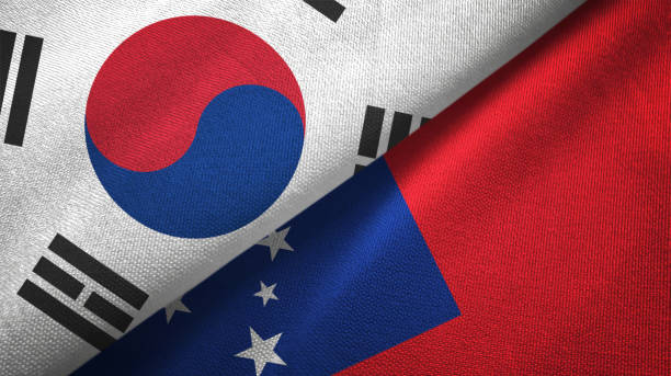 istock Samoa and South Korea two flags together textile cloth, fabric texture 1126669131