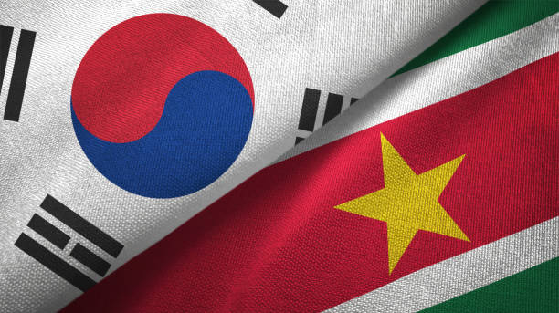 istock Suriname and South Korea two flags together textile cloth, fabric texture 1126669208