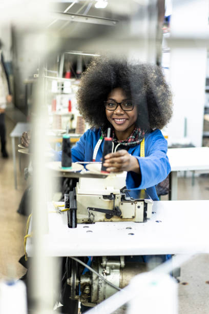 istock Young afro woman in sewing workshop 1126676848