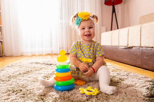 istock Baby girl playing with didactic toys 1126680781