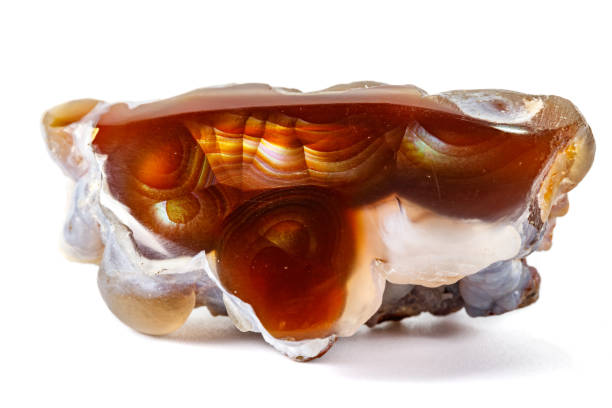istock Macro mineral stone fiery Agate on a white background 1126682494