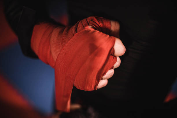istock Man hand wrapped in boxing bandages 1126684946