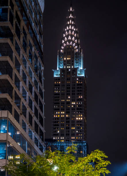 istock Moon over Chrysler building, Manhattan by Night 1126693278