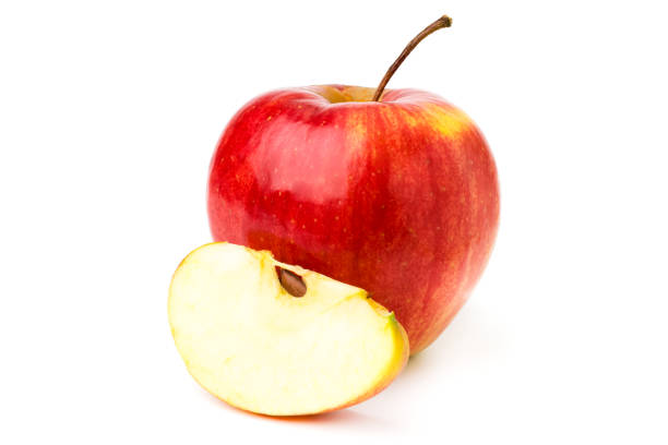 istock Ripe red Apple and slice, closeup. 1126695360