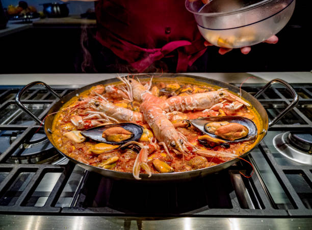 istock Pot with paella in cooking 1126695644