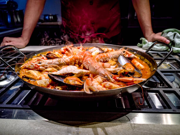 istock Pot with paella in cooking 1126695707