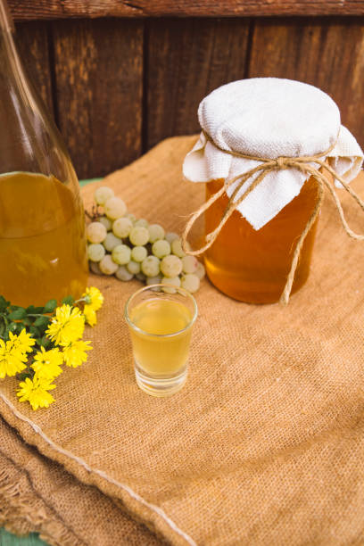 Homemade drink Homemade drink of brandy and honey serbian raki stock pictures, royalty-free photos & images