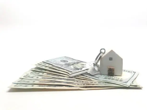 Photo of House + Key + Money