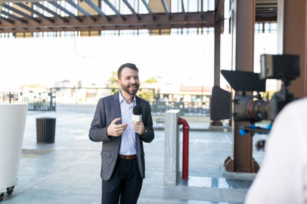 istock Good Looking Journalist Covering An Event 1126701308